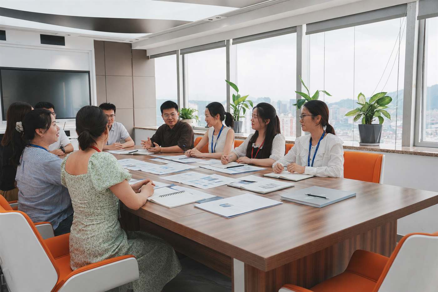 Professional automation sourcing and customer support team meeting